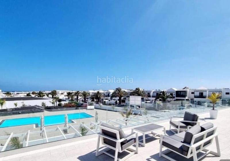 Foto ba72a9e2-b449-4f25-ab8d-0665d8329a17. Casa adossada amb piscina a costa Teguise Teguise