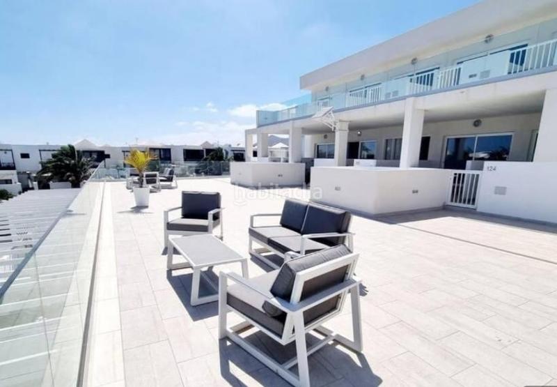 Foto f303df86-fa6c-49ea-a939-6fc8c18750be. Casa adossada amb piscina a costa Teguise Teguise