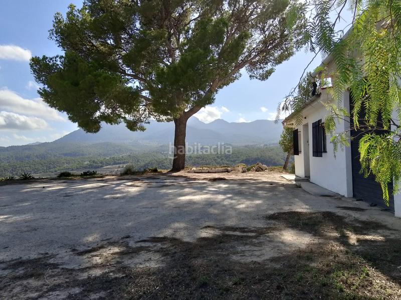 Foto 19bd7e07-b412-43e7-bc95-3ef9e8765bf1. Rural plot in Tibi