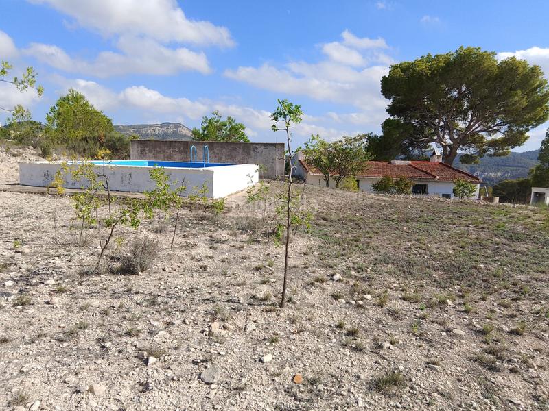 Foto f970d089-1db5-4b27-a827-9449efccd2ff. Rural plot in Tibi