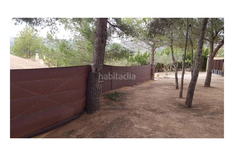 Foto c3df4c71-17a8-45b4-9d6e-b1540b6a14ec. Xalet amb xemeneia aparcament piscina a Onil