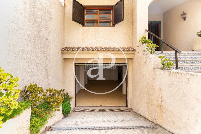 Foto 1607a445-2766-40fd-bcf6-08d87649f476. House with heating parking in Mareny Blau Sueca