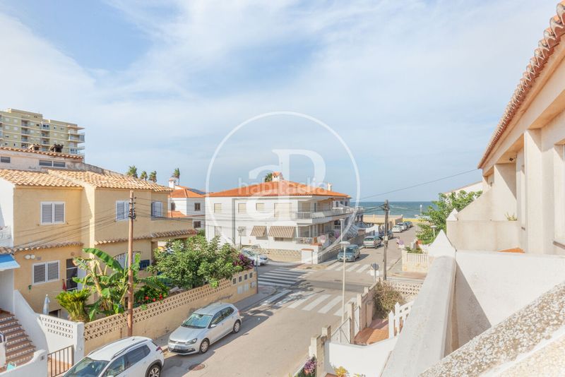 Foto 08331804-59d7-4e00-8856-98e3dda721c8. Casa aparellada amb calefacció aparcament a Mareny de Barraquetes Sueca
