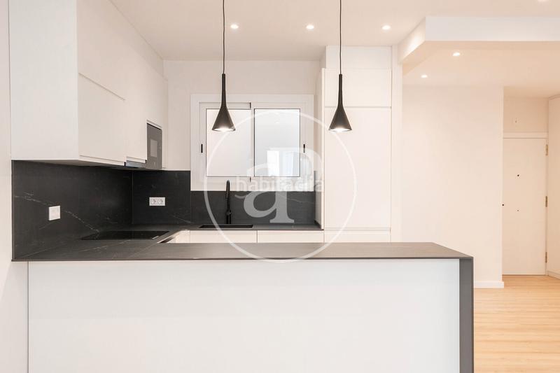 Foto fbeb14c7-4cca-46a7-8cad-334ce11de865. Appartamento con riscaldamento in Putget - Farró Barcelona