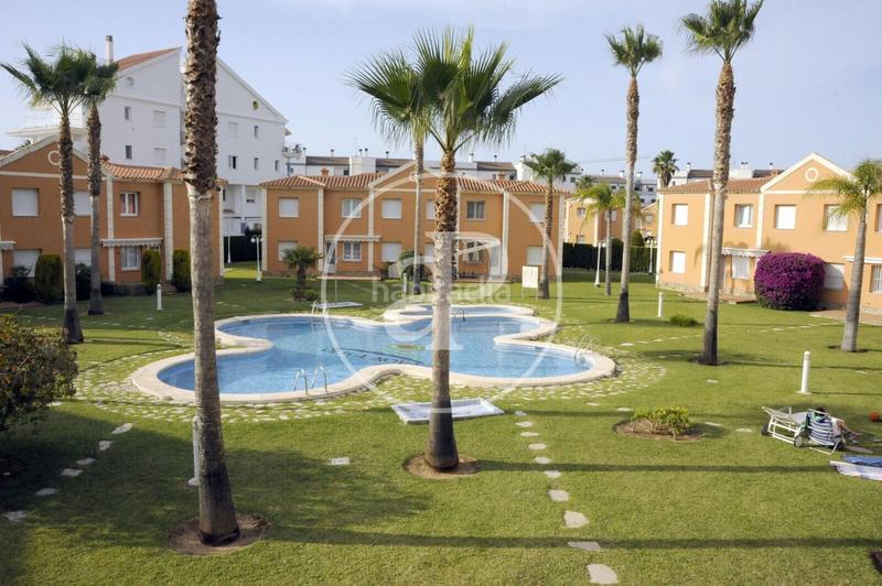 Foto 447f13ad-b783-40d0-8565-337d3dbfda07. Location appartement avec chauffage parking piscine dans Oliva