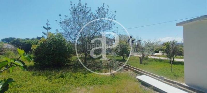 Foto 4475b021-4149-4055-83bf-0a8c28d46b51. Casa aparellada amb calefacció aparcament piscina a Gandia