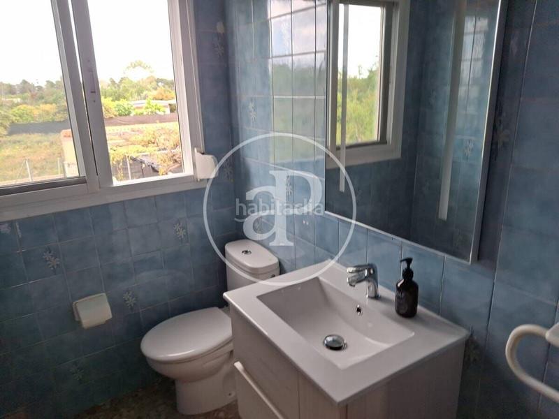 Foto 6a19e612-290f-417c-9b3a-695074cf0a76. Casa aparellada amb calefacció aparcament piscina a Gandia