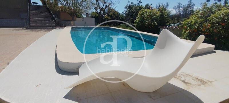 Foto 80fa8de9-7c7c-4555-a340-43eb10f227fd. Casa aparellada amb calefacció aparcament piscina a Gandia