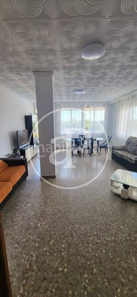 Foto b8d4e62e-e5d4-4396-8d4b-a3ff02188b67. Casa aparellada amb calefacció aparcament piscina a Gandia