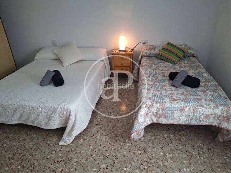 Foto d83841b0-d324-4b14-857f-2a7811690822. Casa aparellada amb calefacció aparcament piscina a Gandia