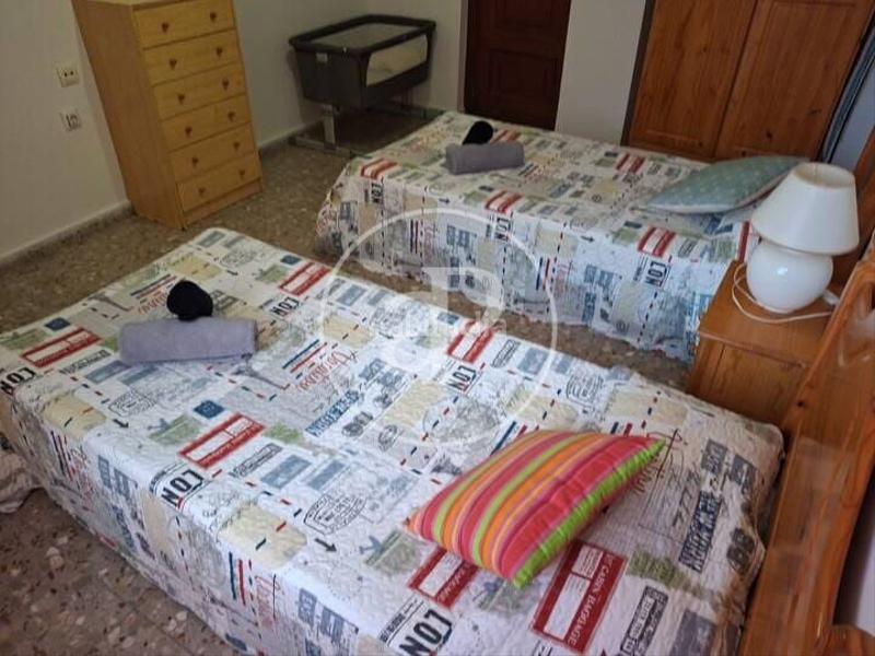 Foto e2e8f705-d598-440e-a450-2b98bddf20ab. Casa aparellada amb calefacció aparcament piscina a Gandia