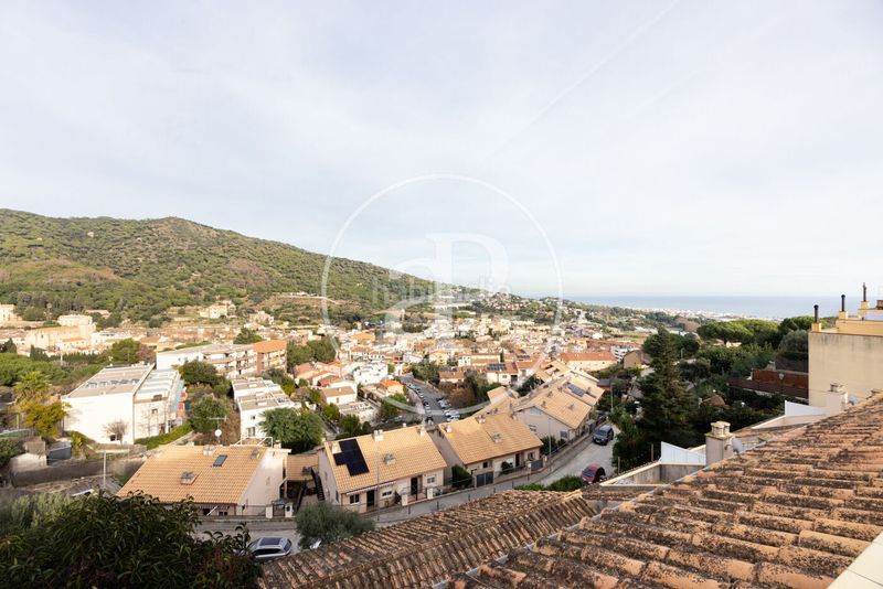 Foto e8c4c70f-9c1f-4dc7-836d-905662d0ea30. Casa adossada amb calefacció aparcament a Teià