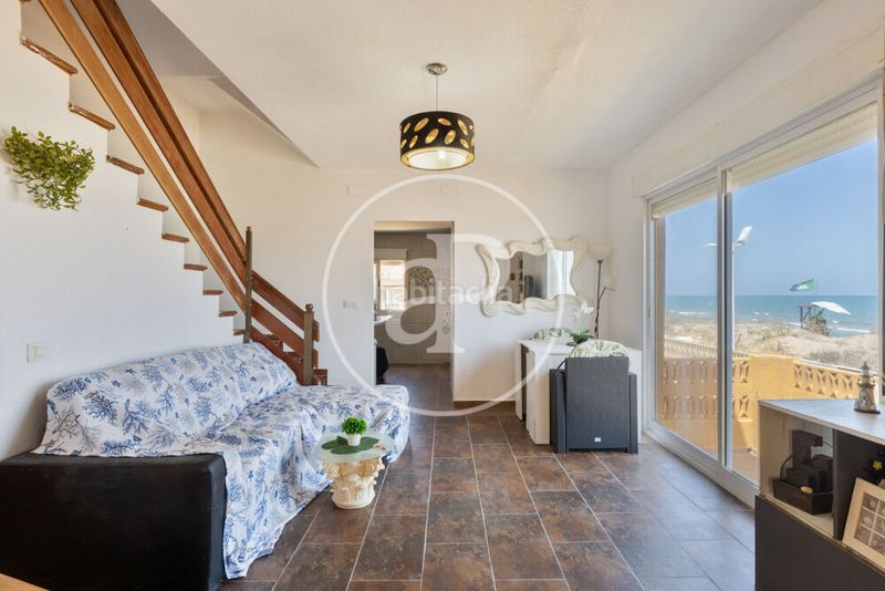Foto a5a659da-574e-41bd-bcf3-fa5988846443. Casa adossada amb calefacció aparcament a Mareny de Barraquetes Sueca