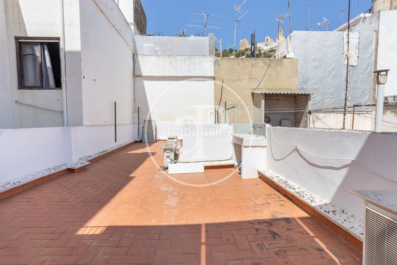 Foto 9f501c2a-b228-43c2-96e2-ff0721c142af. Casa aparellada amb calefacció a pueblo de Cullera Cullera