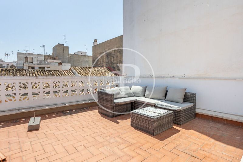Foto c9bd50df-a286-4165-a06d-3c181df85340. Casa aparellada amb calefacció a pueblo de Cullera Cullera
