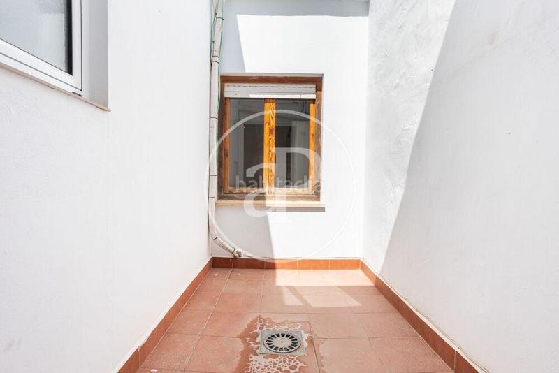 Foto e4e3b13d-604e-4de9-978a-13a3d688cb2e. Casa aparellada amb calefacció a pueblo de Cullera Cullera