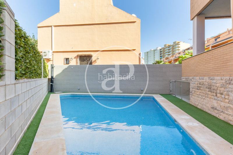Foto bcc04228-e9ec-41f9-a7c5-ac74f13885f7. Casa amb calefacció aparcament piscina a Mareny Blau Sueca