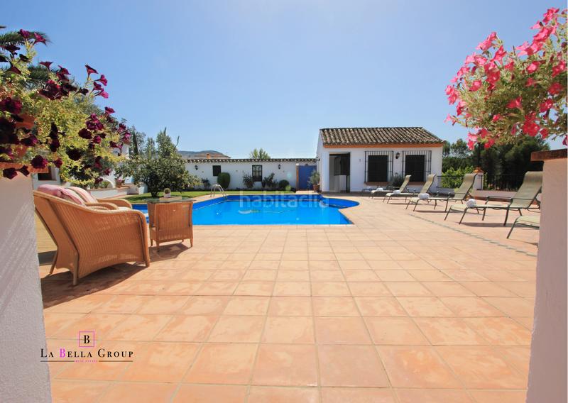 Foto b6ab480a-392d-4b96-ae02-f5ffff0b7e0d. Casa con camino parcheggio piscina in Priego de Córdoba