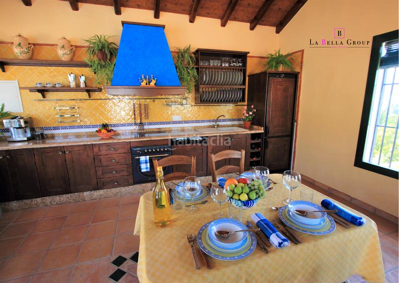 Foto c38c8a5b-9f40-4650-8906-5858501cd667. Casa con camino parcheggio piscina in Priego de Córdoba