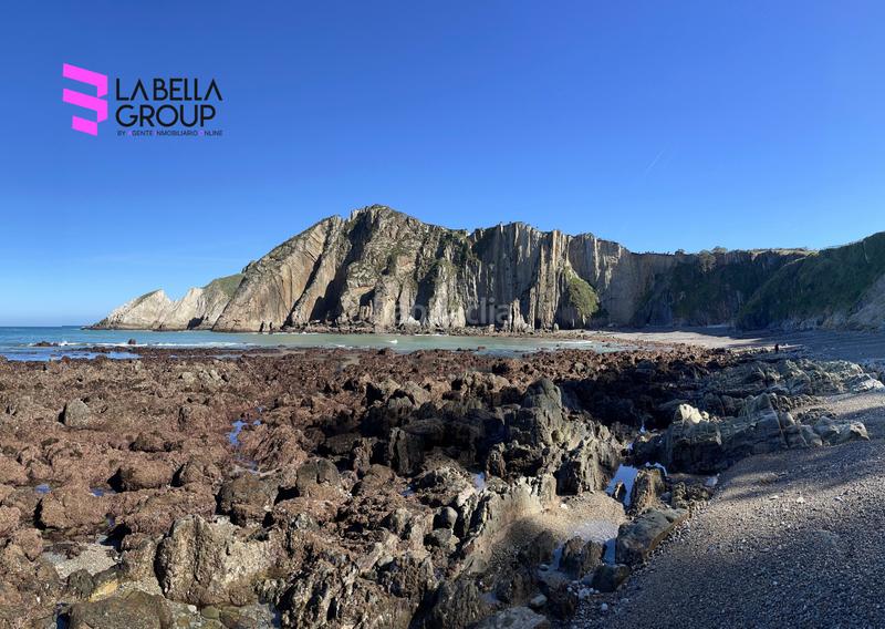 Foto c716d674-13ce-4871-900e-3ef2ee0d2340. Casa con camino in Cudillero