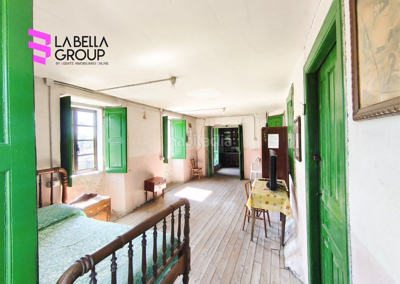 Foto 1b3cf4a5-027c-47be-b7fd-1b0a6e2f3a2e. Casa en Friol