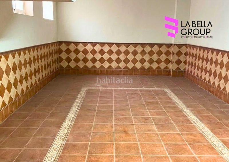 Foto 607b80a3-50e9-4bed-b634-d5edfddf7b8c. Casa aparellada amb xemeneia calefacció aparcament a Jódar