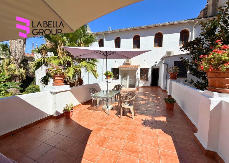 Foto 35303759-eee5-4d9d-b341-b50e67571007. Casa aparellada amb xemeneia aparcament piscina a Xàtiva