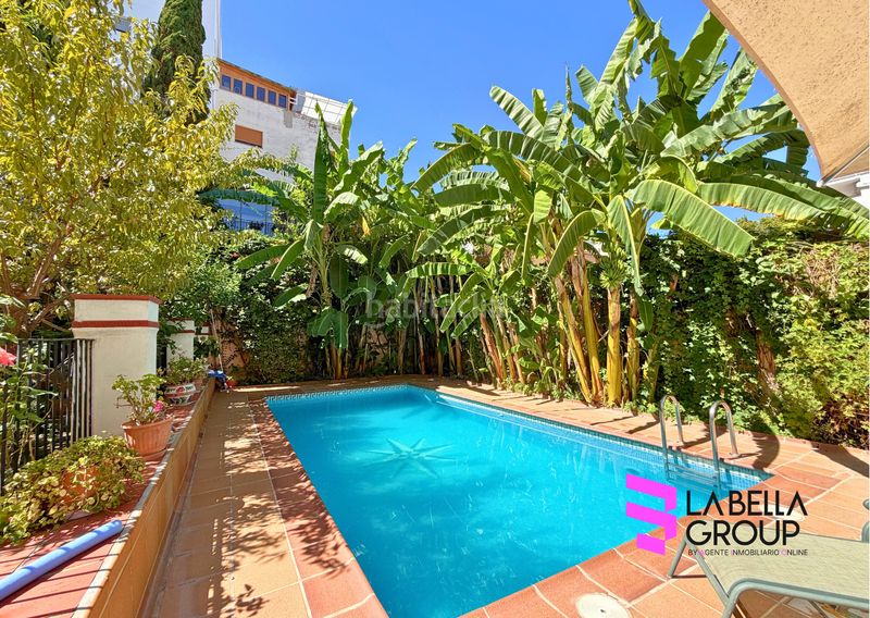 Foto 6b919cb6-a9ef-49b4-a38c-e4f6c06452c0. Casa aparellada amb xemeneia aparcament piscina a Xàtiva
