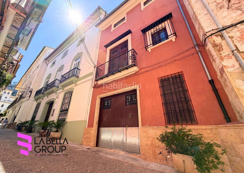 Foto 6ba13196-17b1-4ecf-bde4-adb21231955e. Casa aparellada amb xemeneia aparcament piscina a Xàtiva