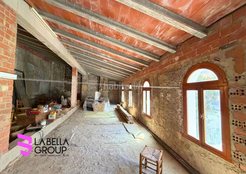 Foto 80ad4d6d-663f-4a66-804e-55161d14033f. Casa aparellada amb xemeneia aparcament piscina a Xàtiva