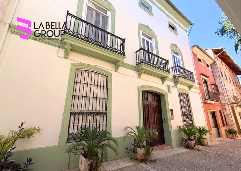 Foto a9f6bd2b-dc8e-4dc7-b3bd-507dd7378ece. Casa aparellada amb xemeneia aparcament piscina a Xàtiva
