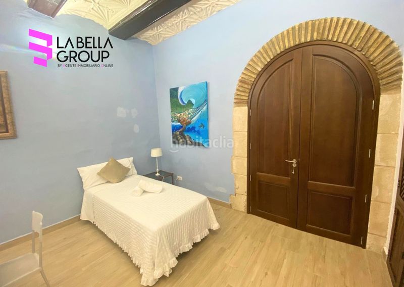 Foto d414d278-fa0d-4ba2-9cee-697fc9aa4b0c. Casa aparellada amb xemeneia aparcament piscina a Xàtiva