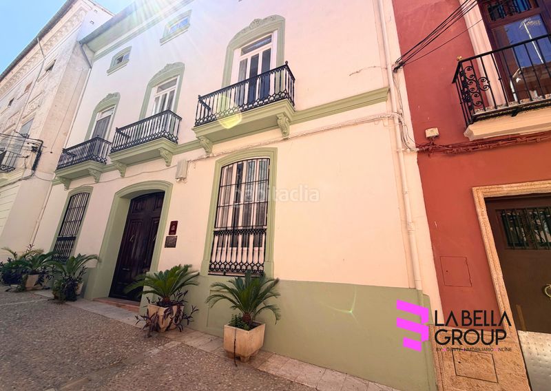 Foto e10ea2f4-a69c-4421-81ad-81ad207e526a. Casa aparellada amb xemeneia aparcament piscina a Xàtiva