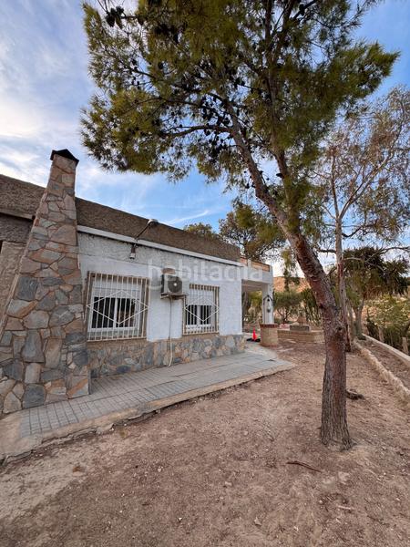 Foto 557a34e5-c923-44d5-8d66-b5e3b051618c. Affitto chalet con camino parcheggio piscina in Peña de las Águilas Elche / Elx