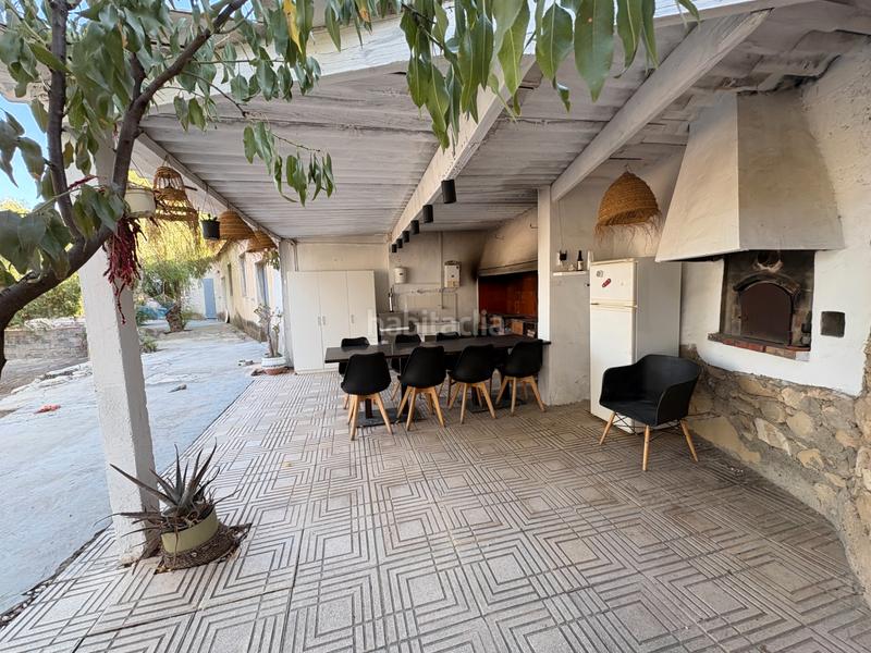 Foto a3051838-dbc6-4ec2-abf7-7137d0f39c7d. Affitto chalet con camino parcheggio piscina in Peña de las Águilas Elche / Elx