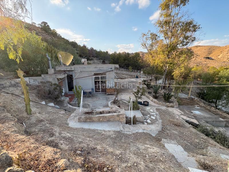 Foto 153bb4d6-b7b2-4717-af39-20693ff71f91. Lloguer xalet amb xemeneia aparcament piscina a Peña de las Águilas Elche / Elx