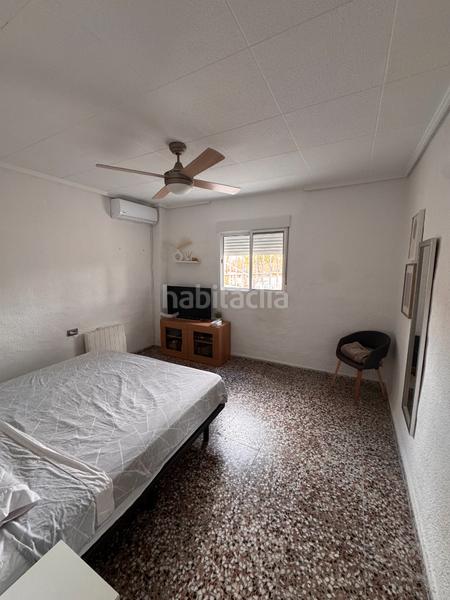 Foto 3e2f8c8d-fbb0-4177-ab64-91135f6c6cde. Lloguer xalet amb xemeneia aparcament piscina a Peña de las Águilas Elche / Elx