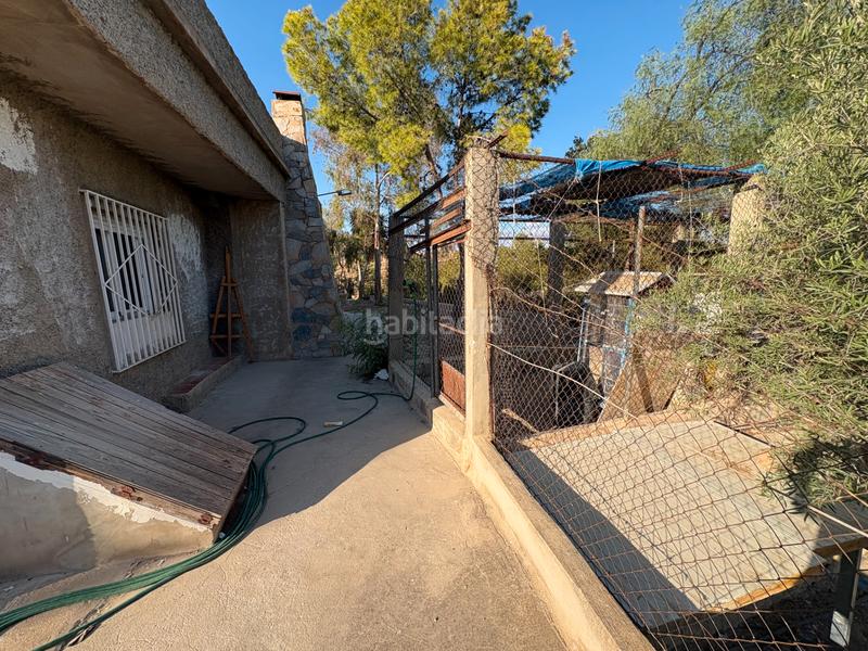 Foto 3efb2bfd-a3d4-4bfa-97e6-15b68598f145. Lloguer xalet amb xemeneia aparcament piscina a Peña de las Águilas Elche / Elx