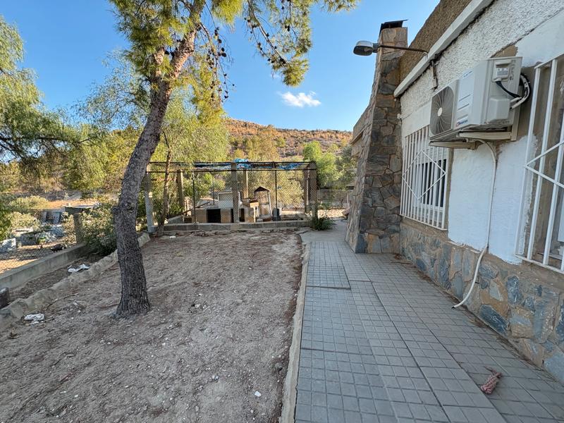 Foto 00384a2e-6442-41c4-a9ad-22bcabbd966c. Location chalet avec cheminée parking piscine dans Peña de las Águilas Elche / Elx