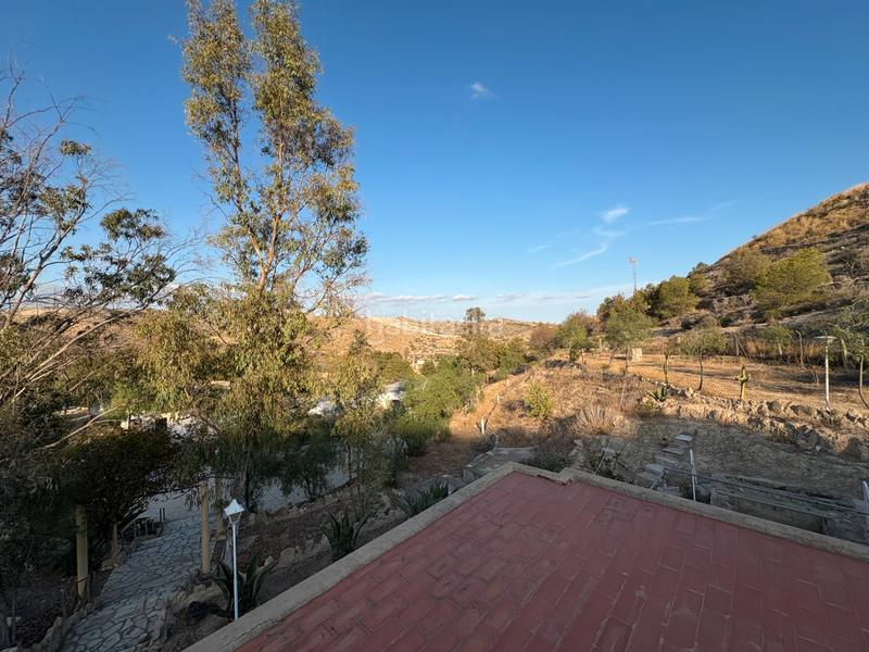 Foto d414482e-2f40-472e-8bff-1a86007b0899. Location chalet avec cheminée parking piscine dans Peña de las Águilas Elche / Elx