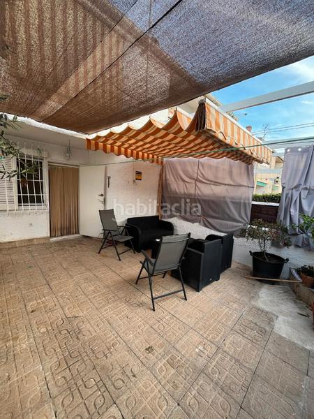 Foto 437eeed1-aec2-4c1c-b740-17365e040dd4. Casa aparellada a calle urbano arregui 63 a Playa de los Náufragos Torrevieja