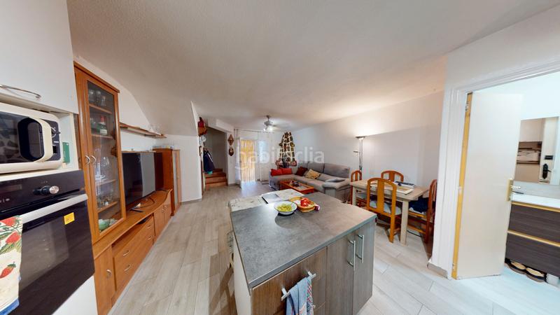 Foto 68a1f0e7-80e8-4735-bce0-1186c2a35955. Casa aparellada a calle urbano arregui 63 a Playa de los Náufragos Torrevieja