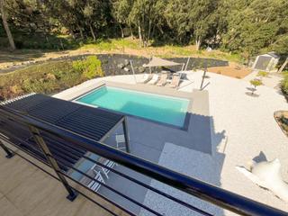 Casa a Urbanizacion vall repos 162. Villa moderna con piscina privada y vistas a les gavarres