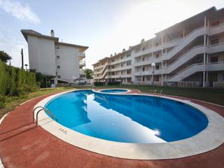 Piccolo appartamento  Carrer saturn 10. Apartamento con garaje y piscina