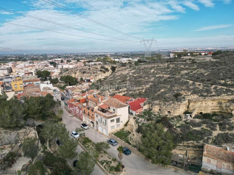 Foto 0bc74249-e37d-40fe-a5d1-a0eca66f630e. Casa aparellada amb calefacció aparcament a Rojales