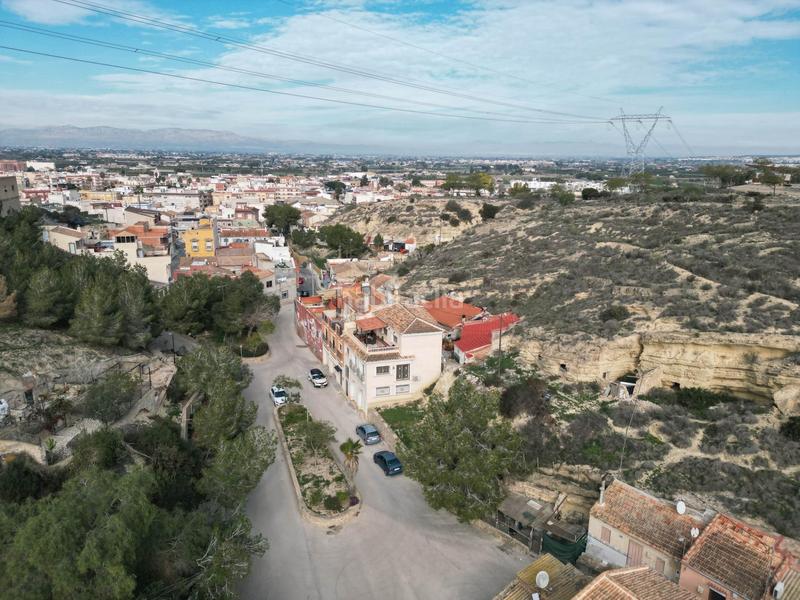 Foto 3dc8b704-d644-49ec-b2d8-ffbaf47b6c71. Casa aparellada amb calefacció aparcament a Rojales