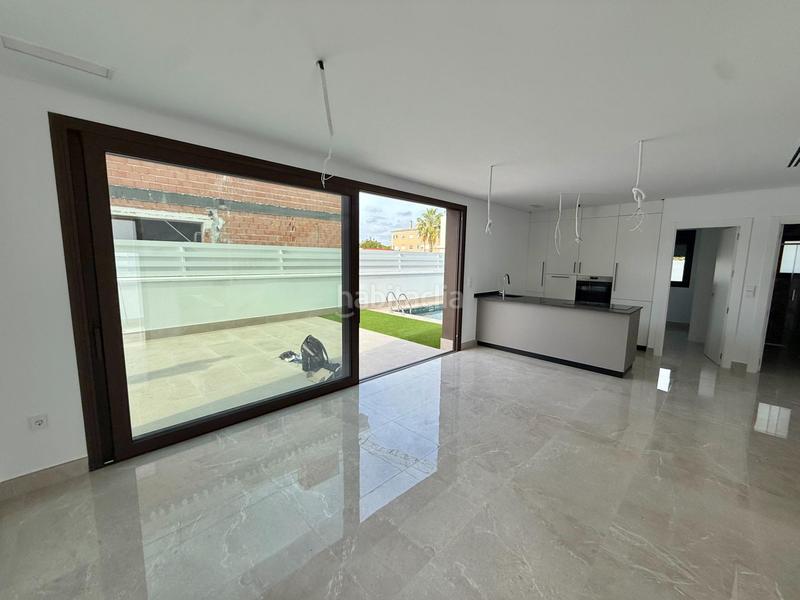 Foto 66ba19ab-a68a-4245-b7ba-a0937027efc0. Chalet dans calle calle irlanda dans La Marina Elche / Elx