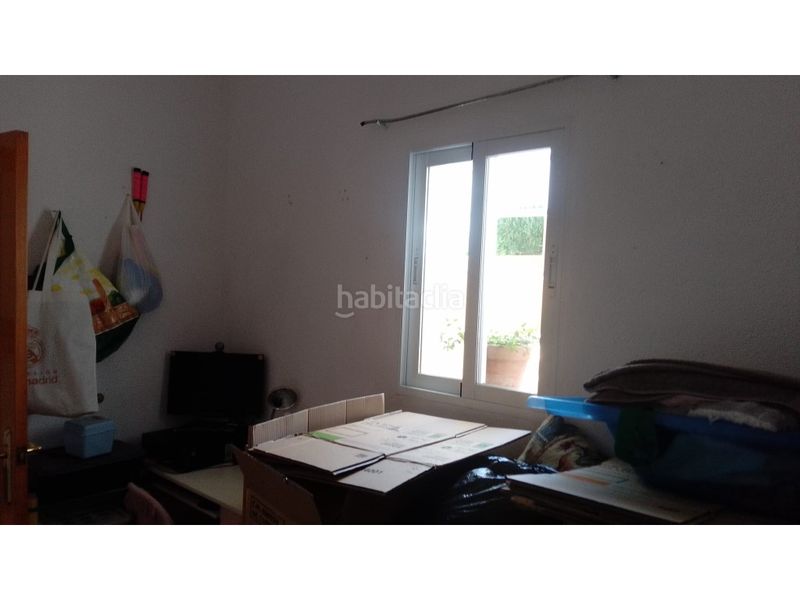 Foto ac785ab2-4c0d-4586-8335-eed745484a7e. Casa amb aparcament a Centro Puertollano
