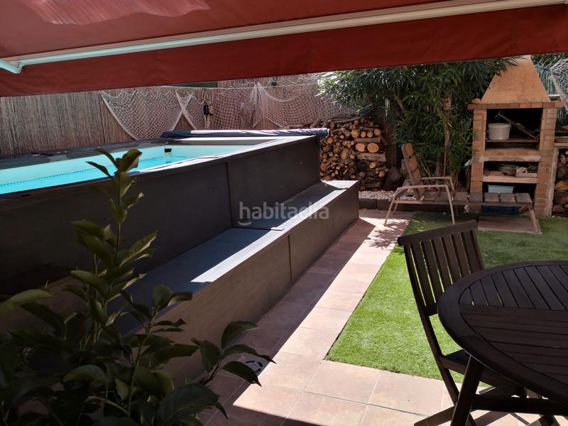 Foto 697e0977-c222-41f1-a6d8-5ca2634f8710. Maison jumelée avec cheminée chauffage parking piscine dans Manlleu