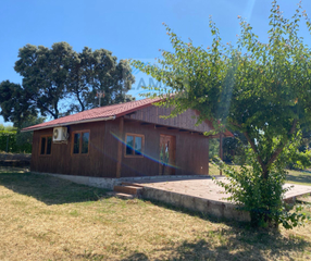 Masia  Diseminado dehesa los pinos. Parcela con casa de madera y nave en el pino